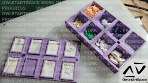 A purple box with cutouts for eight different medicines or mixtures of medicines.