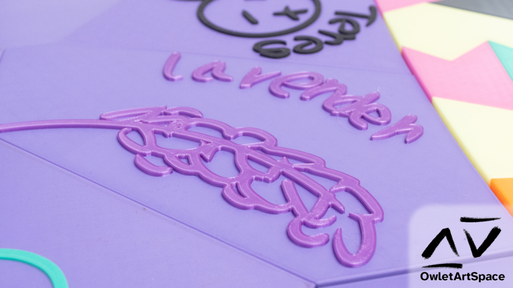 A close-up on Lavender's plate. It has a silk purple lavender branch with their name.